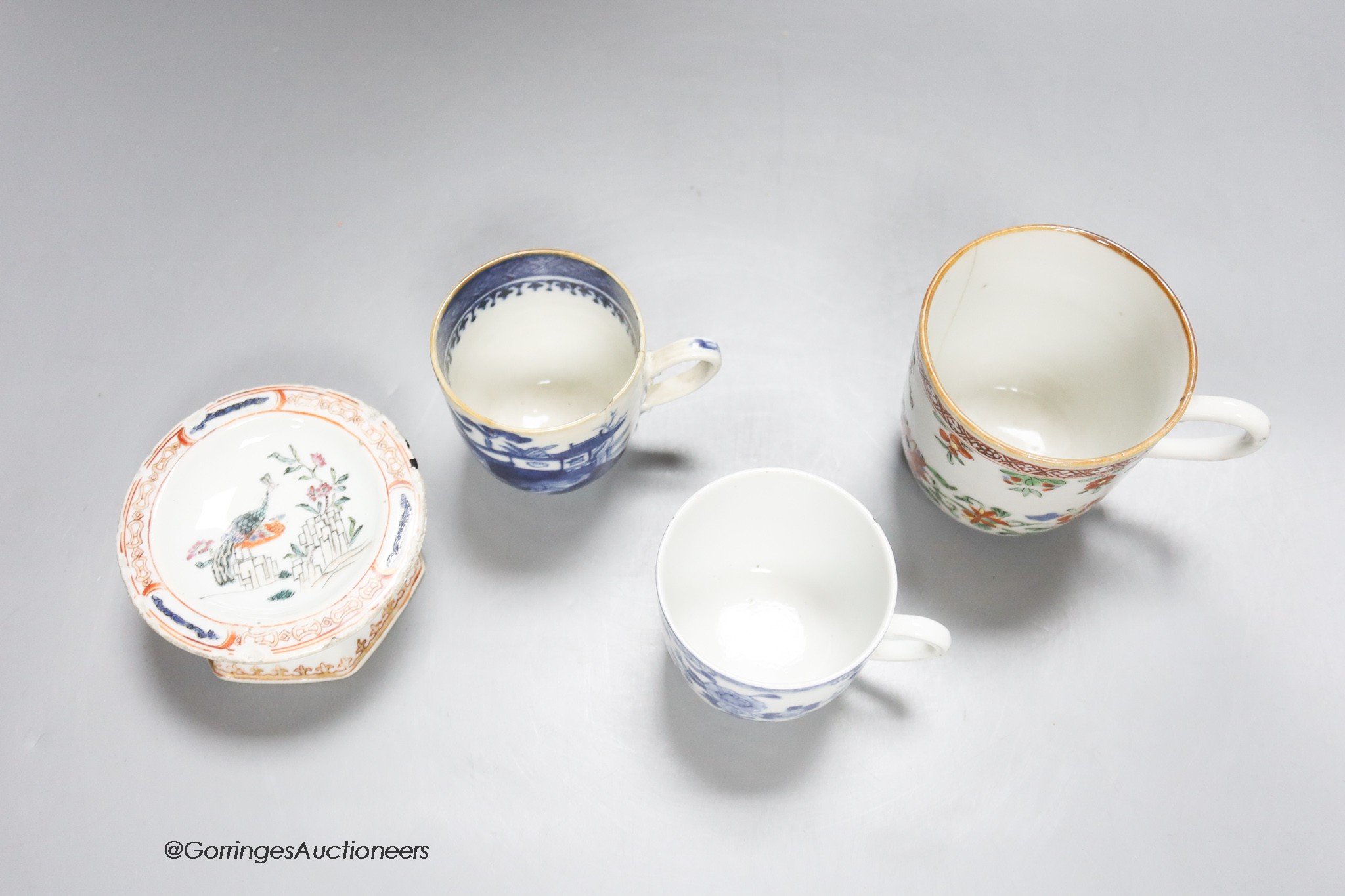 Three Chinese export coffee cups and a similar salt cellar, 18th century